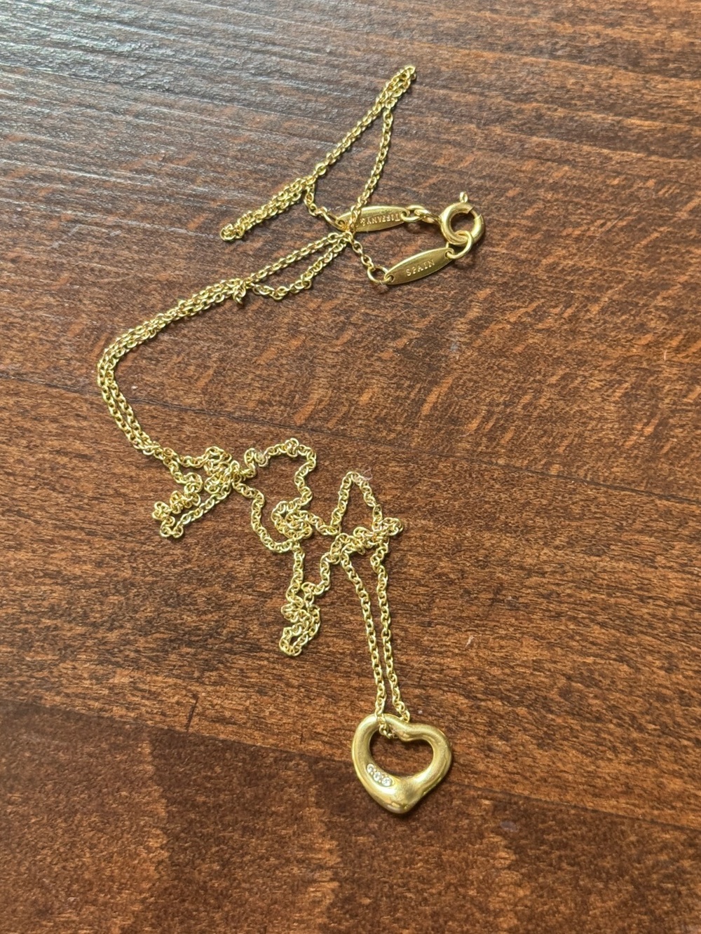 Tiffany & Co. Elsa Peretti Open Heart Pendant in gold with diamonds